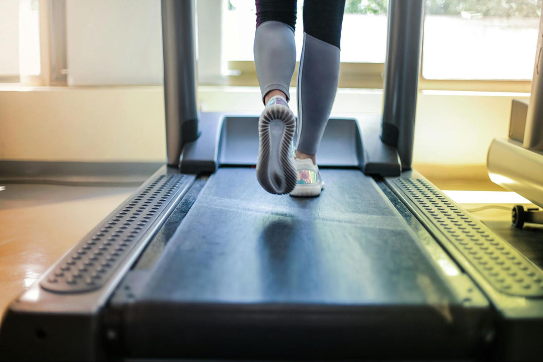 Woman Walking on Treadmill